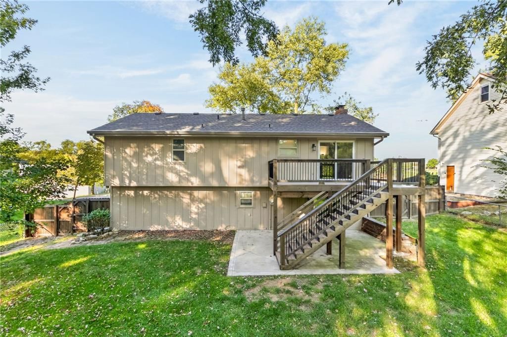 Big backyard, fenced yard and wood fence at 8005 N Congress Avenue, Kansas City, MO 64152