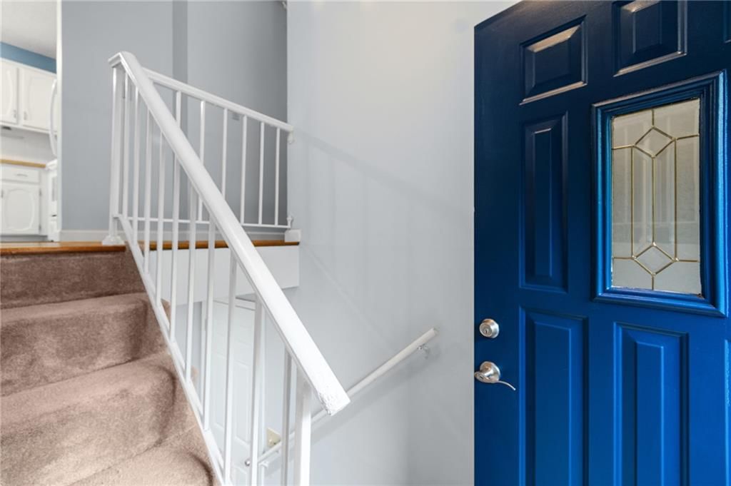 Staircase and iron stair railing at 10517 N McGee Street, Kansas City, MO 64155