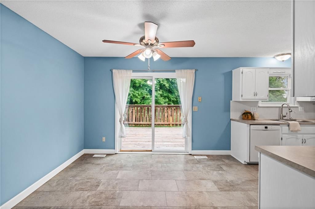 Tile floors and breakfast nook at 10517 N McGee Street, Kansas City, MO 64155