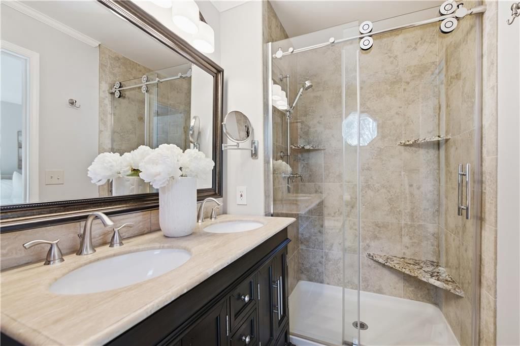Walk-in shower, tiled shower and frameless glass shower at 13203 W 76th Street, Lenexa, KS 66216
