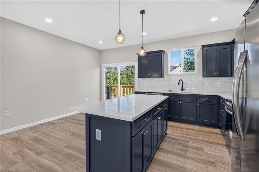 Photo 10 of 40 - 1415 Thomas Drive, Louisburg, KS 66053