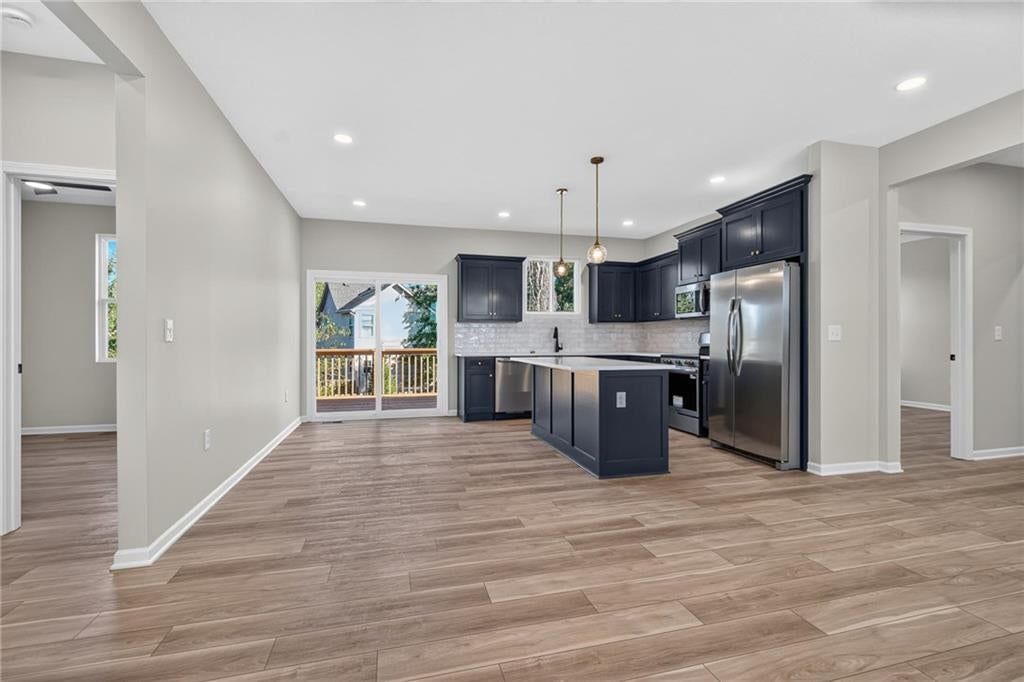 Photo 11 of 40 - 1415 Thomas Drive, Louisburg, KS 66053