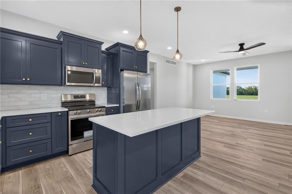 Photo 16 of 40 - 1415 Thomas Drive, Louisburg, KS 66053