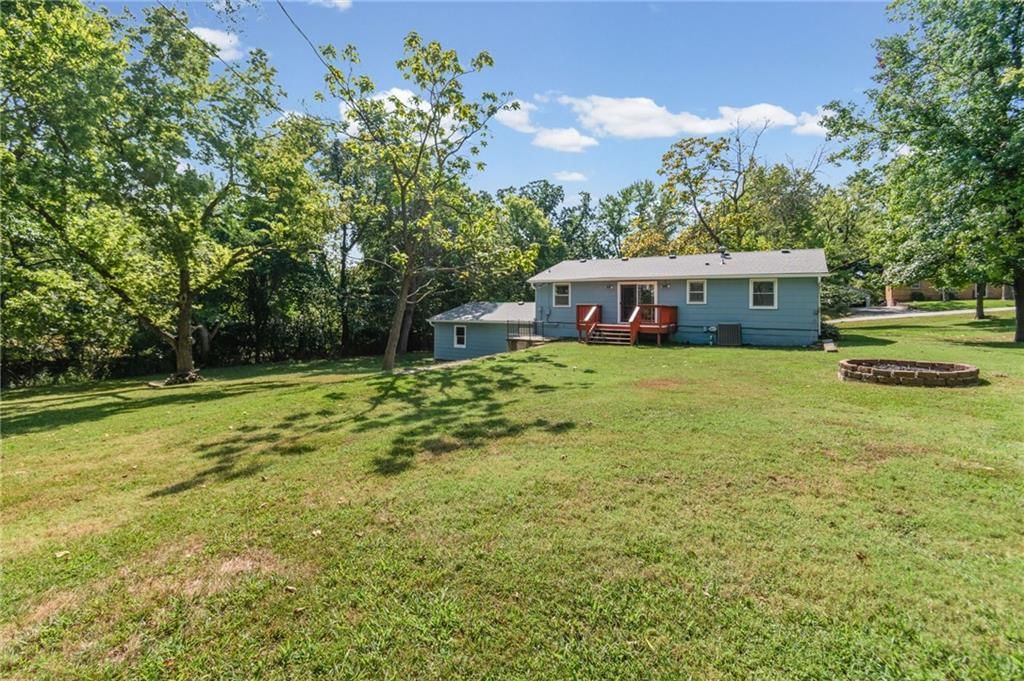 Pond or creek visible on the lot at 4516 NW Gleason Road, Kansas City, MO 64151