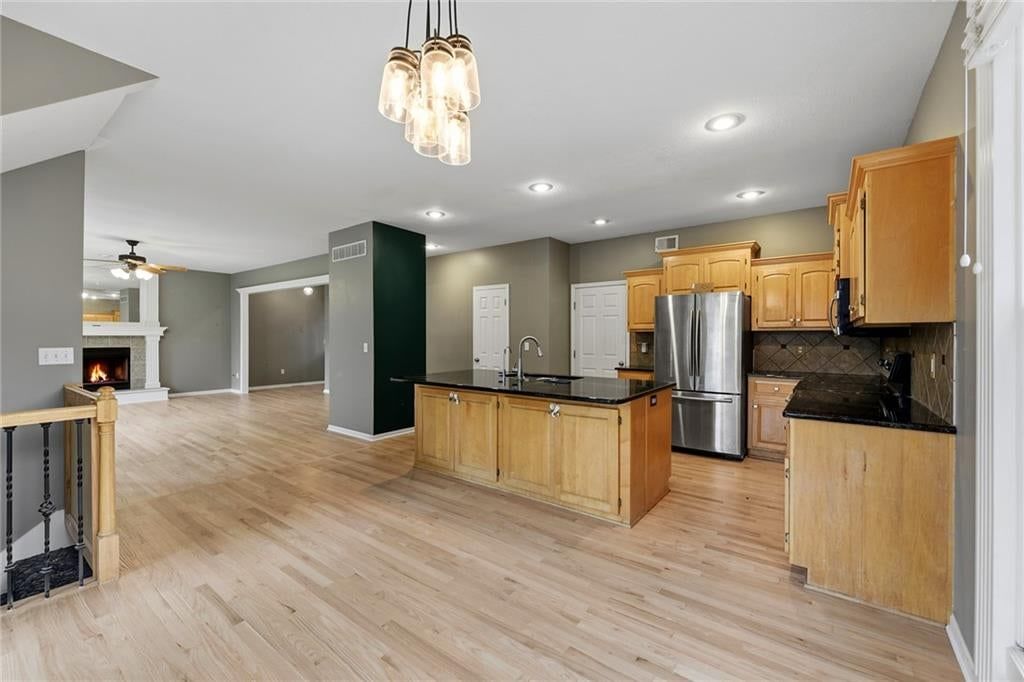 Kitchen island at 1404 Cedar Ridge Circle, Raymore, MO 64083