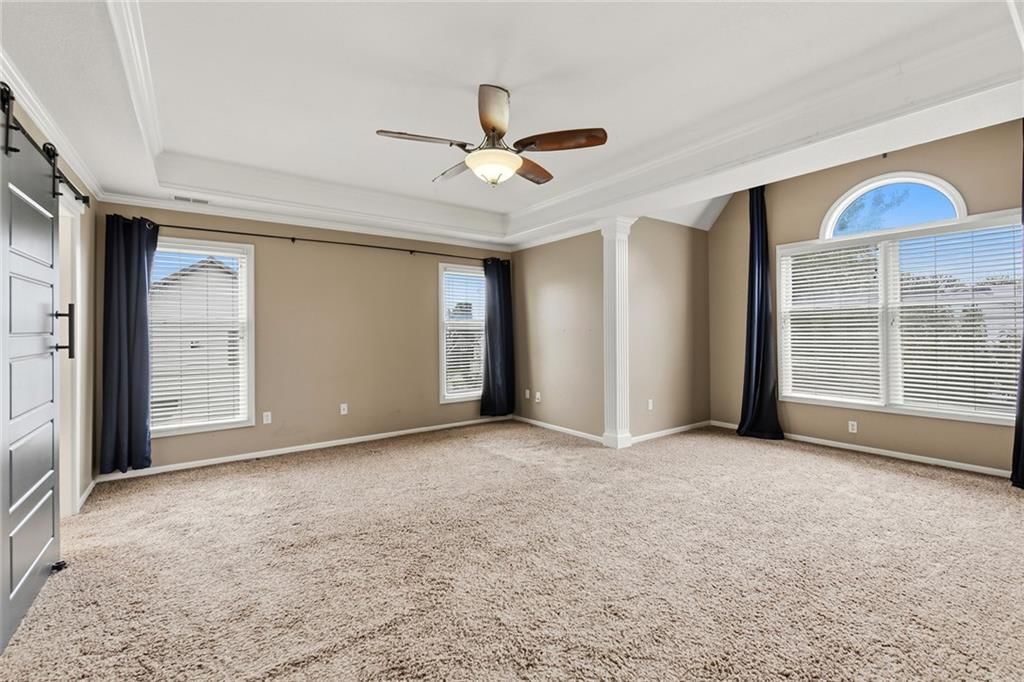 Photo 25 of 31 - 1404 Cedar Ridge Circle, Raymore, MO 64083