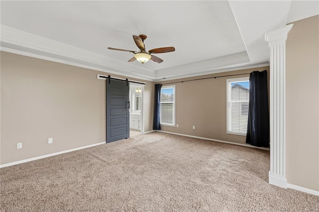 Bedroom sitting area at 1404 Cedar Ridge Circle, Raymore, MO 64083