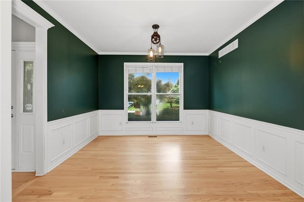 Wainscoting or board and batten at 1404 Cedar Ridge Circle, Raymore, MO 64083