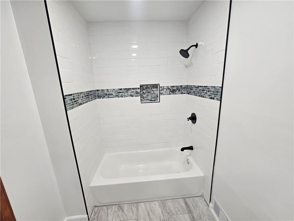 321 E 106th Terrace — photo 12