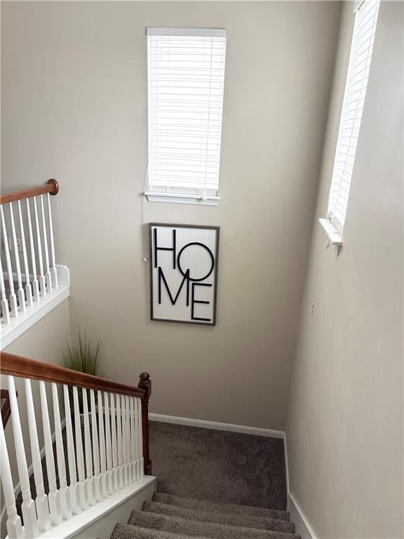 Wood stair railing at 3628 NW 84th Terrace, Kansas City, MO 64154