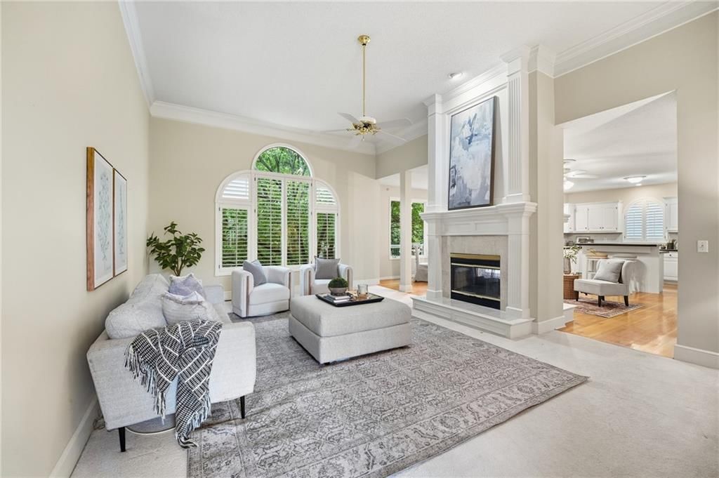 Tall ceilings, floor-to-ceiling windows and statement lighting at 12610 W 126th Street, Overland Park, KS 66213