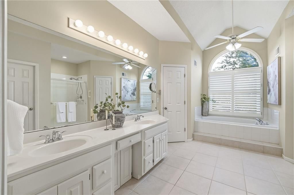 Walk-in shower, tiled shower and frameless glass shower at 12610 W 126th Street, Overland Park, KS 66213
