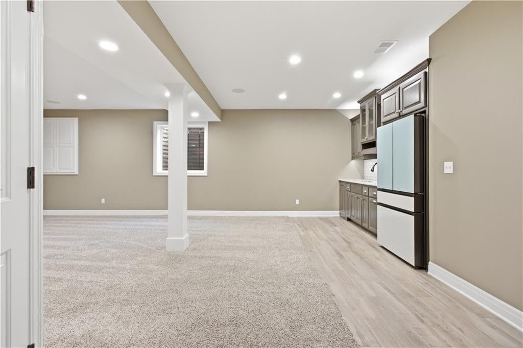 Finished basement and recessed lighting at 11454 S Lakecrest Drive, Olathe, KS 66061