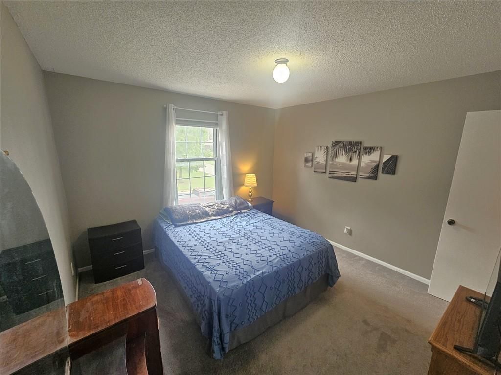 Photo 18 of 45 - 201 W Foxwood Drive, Raymore, MO 64083