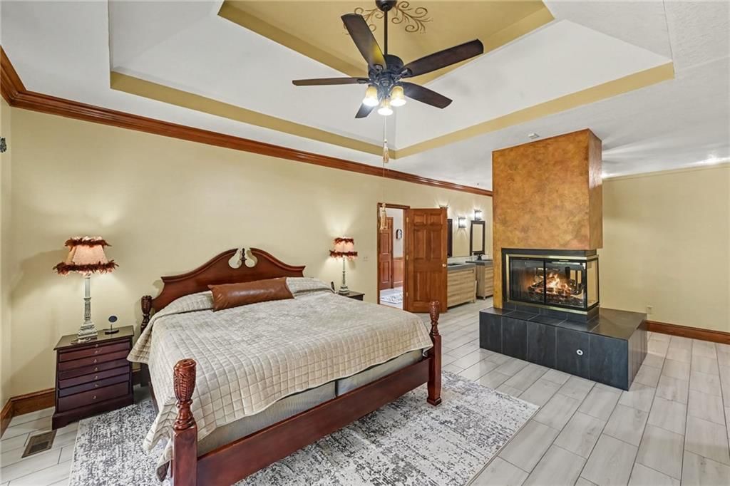 Two-story fireplace at 8225 NW Weatherby Drive, Weatherby Lake, MO 64152