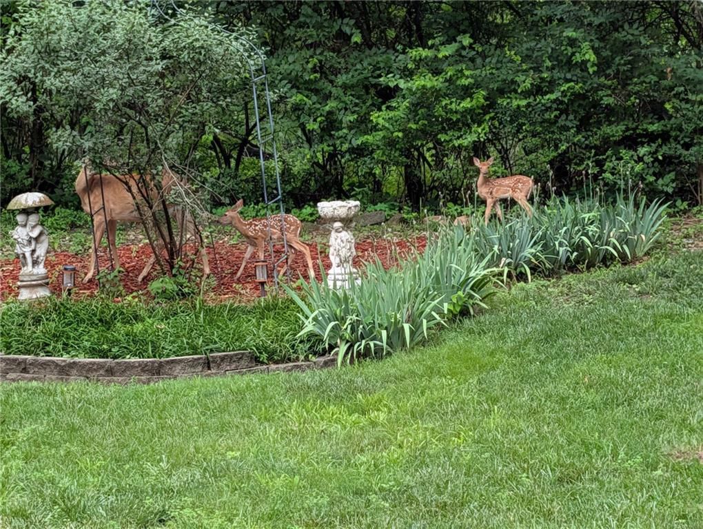 Big backyard at 8225 NW Weatherby Drive, Weatherby Lake, MO 64152