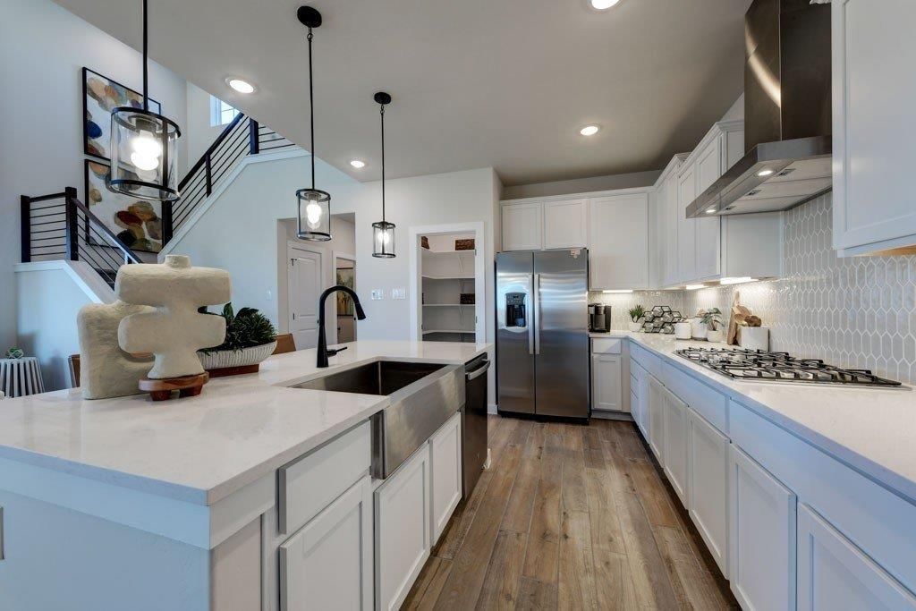 Gas range and stainless steel appliances at 17678 Jubilee Street, Gardner, KS 66030