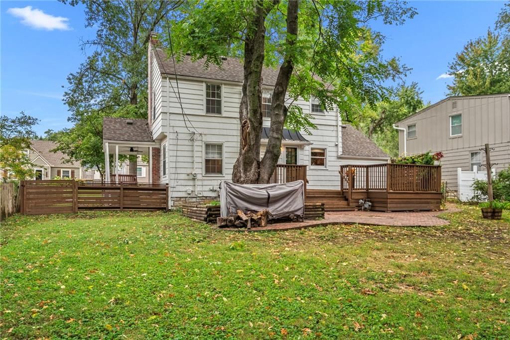 Big backyard, fenced yard and mature trees at 5233 Nall Avenue, Roeland Park, KS 66202