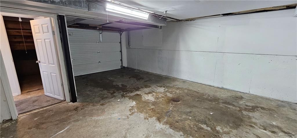Attached garage at 13405-07 Johnson Drive, Shawnee, KS 66216