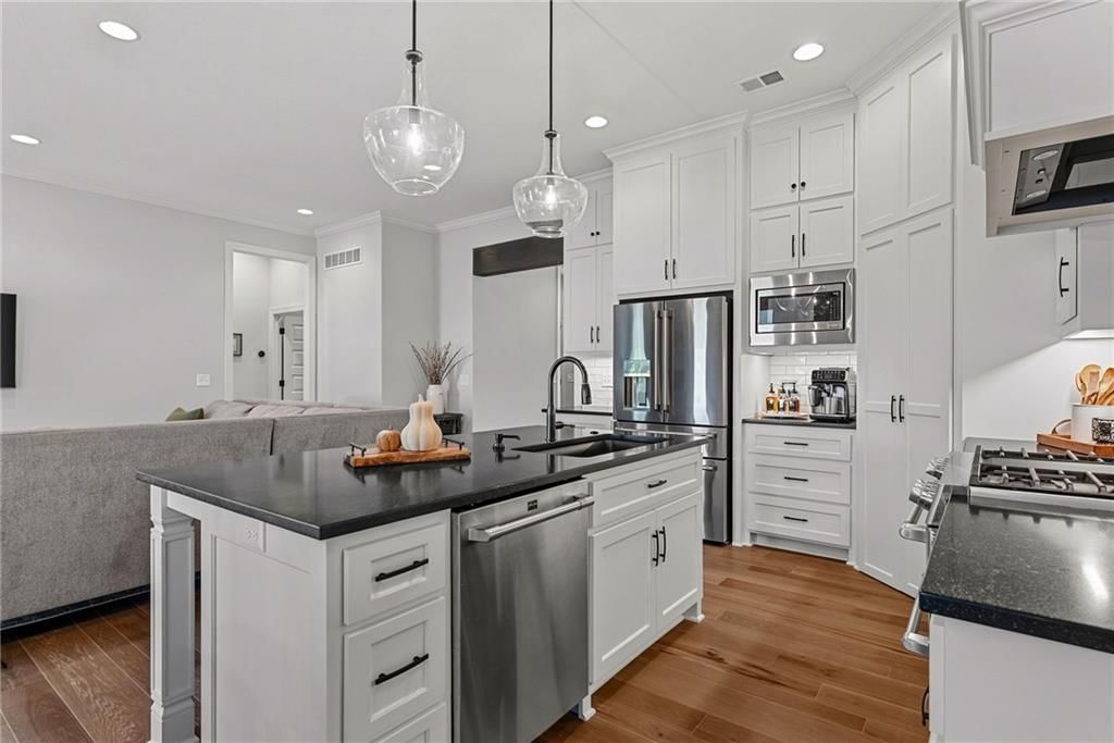 Modern, tall ceilings and open floor plan at 25048 W 112th Terrace, Olathe, KS 66061
