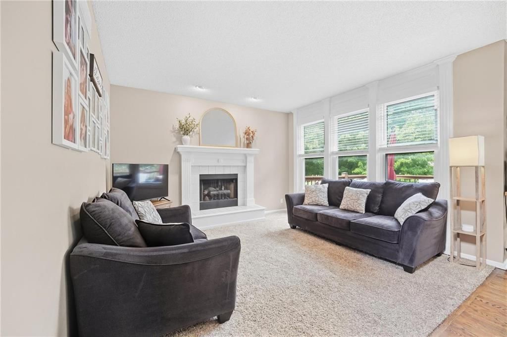 Tall ceilings, fireplace and coffered ceiling at 16150 W 156th Place, Olathe, KS 66062