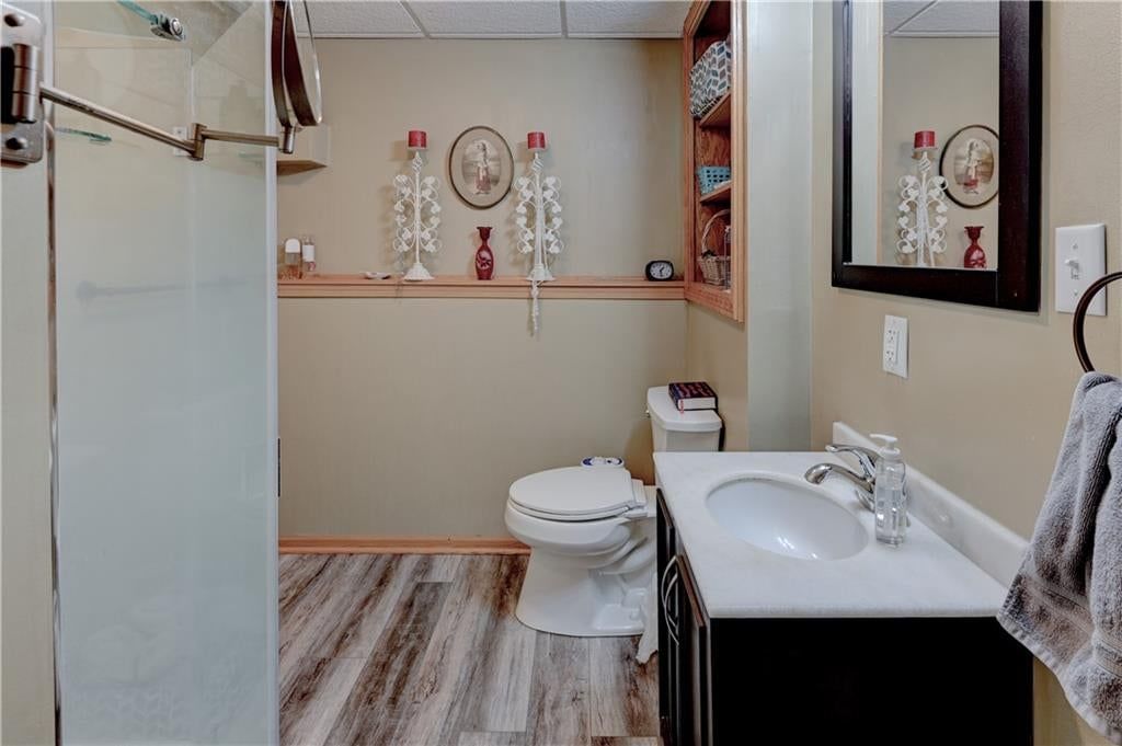 Tiled shower and frameless glass shower at 805 Citadel Drive, Weston, MO 64098