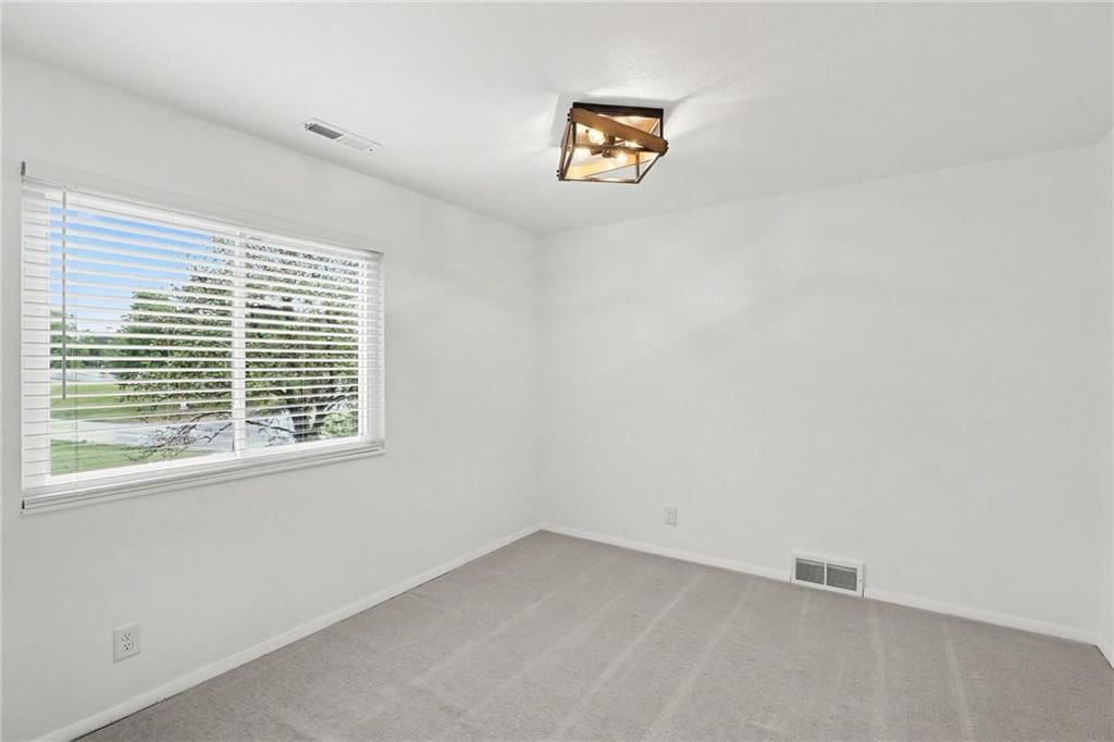 6924 NW Chapel Woods Lane — photo 19