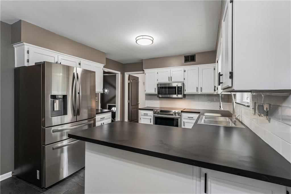 309 NE Brookwood Drive — photo 17