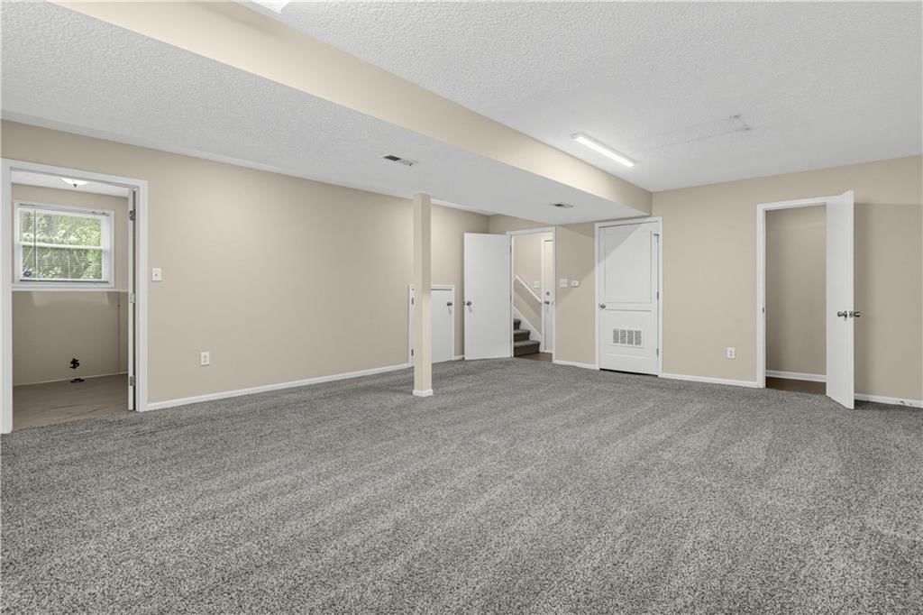 Finished basement at 2129 Sunset Circle, Pleasant Hill, MO 64080
