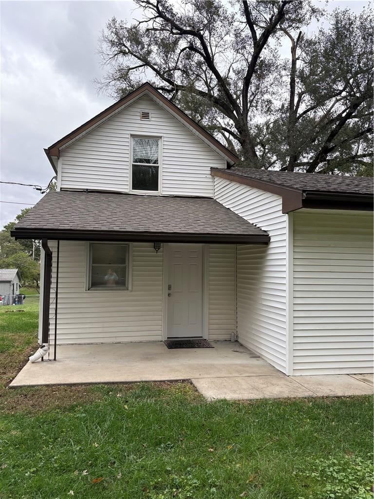 Covered front porch, covered patio and concrete patio at 1224 Kingman Street, Leavenworth, KS 66048