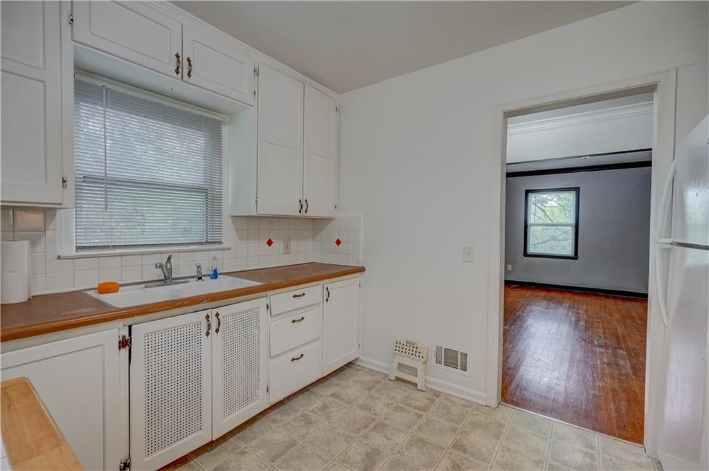 Hardwood floors at 7411 E 83rd Street, Kansas City, MO 64138