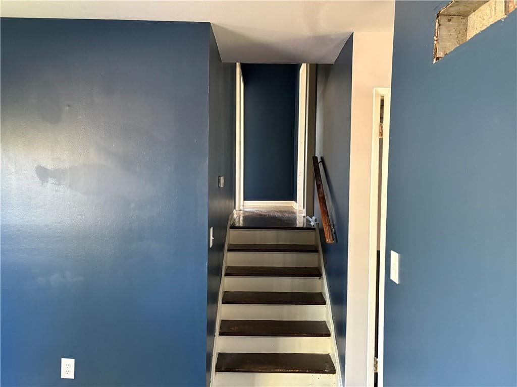 Staircase and accent wall at 4724 N Bristol Avenue, Kansas City, MO 64117