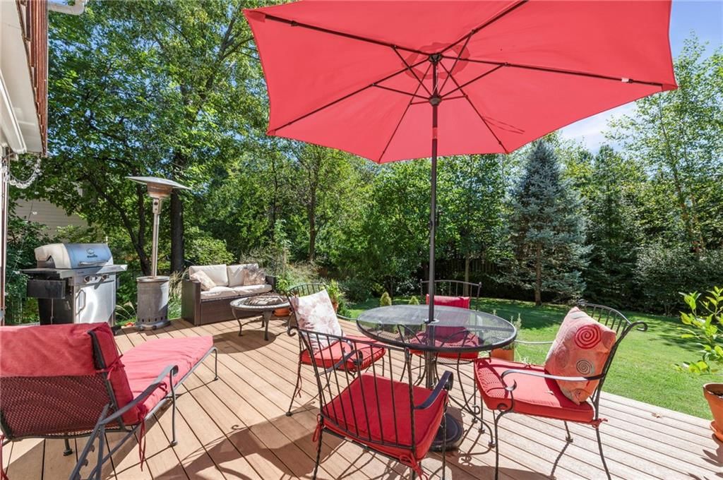 Deck, big backyard and fenced yard at 12846 Sagamore Road, Leawood, KS 66209