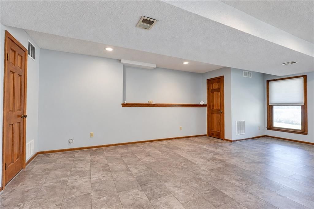 4808 NE PEBBLE BEACH Street — photo 38