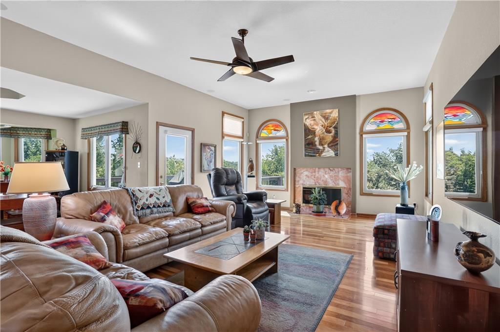 Tall ceilings, fireplace and open floor plan at 12200 E 89th Street, Kansas City, MO 64138