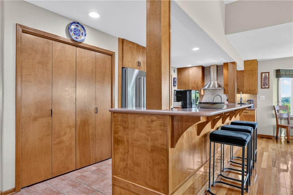 Kitchen island and walk-in pantry at 12200 E 89th Street, Kansas City, MO 64138