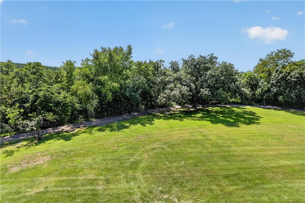 Mature trees at 12200 E 89th Street, Kansas City, MO 64138