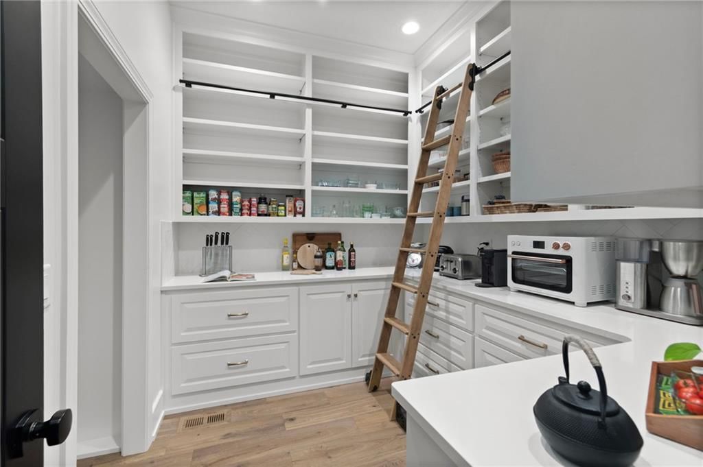 8681 NE Shoal Creek Valley Drive — photo 26