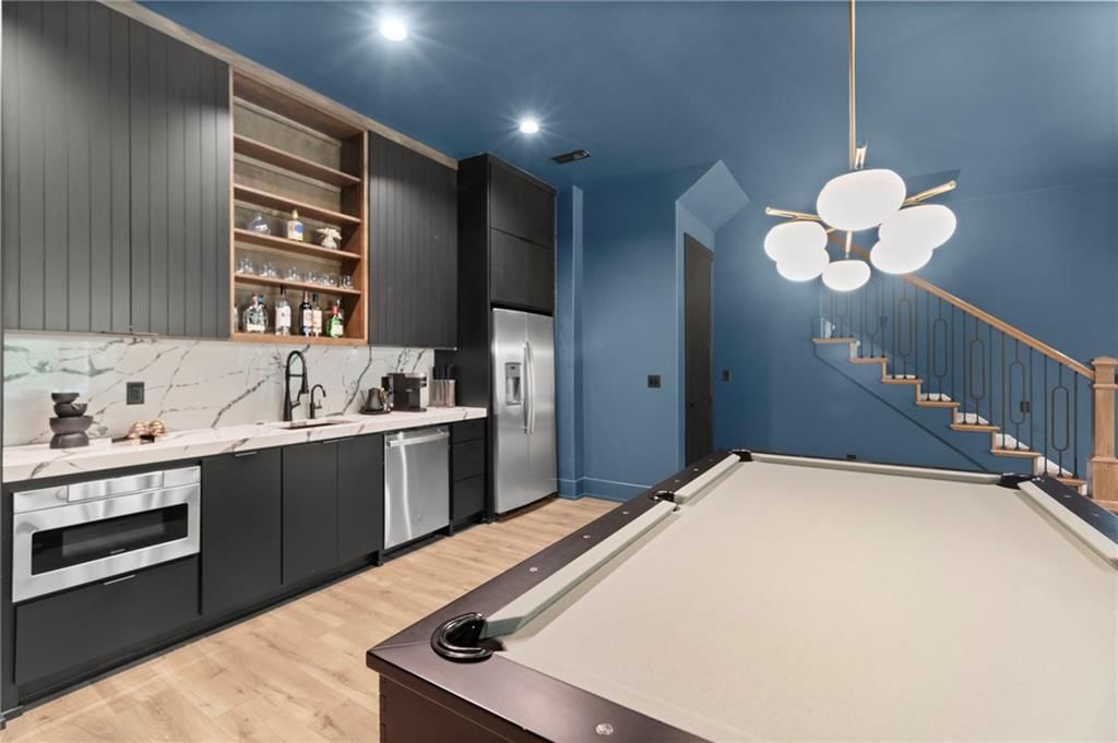 8681 NE Shoal Creek Valley Drive — photo 48