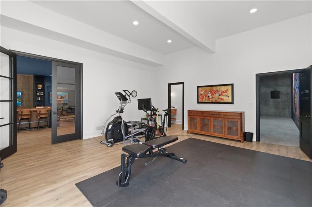 8681 NE Shoal Creek Valley Drive — photo 57