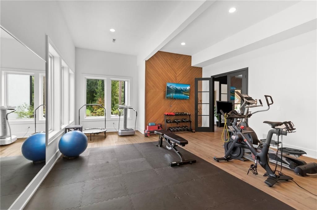 8681 NE Shoal Creek Valley Drive — photo 58