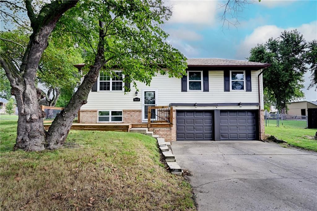 5113 NW Downing Street — photo 1