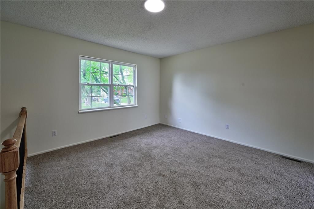 5113 NW Downing Street — photo 4