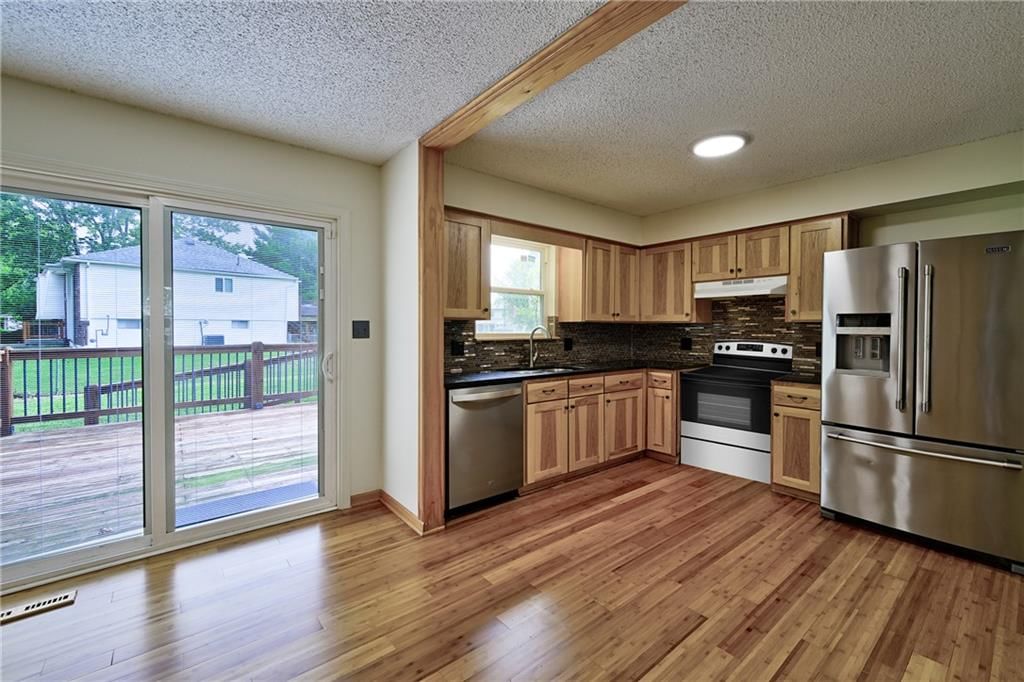 5113 NW Downing Street — photo 5