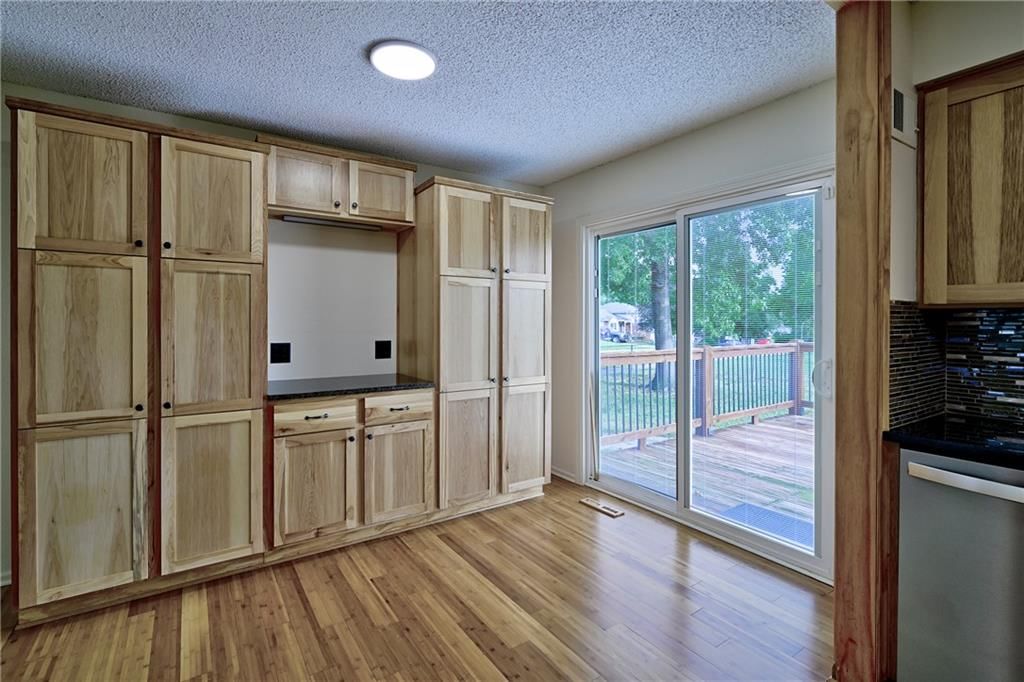5113 NW Downing Street — photo 7