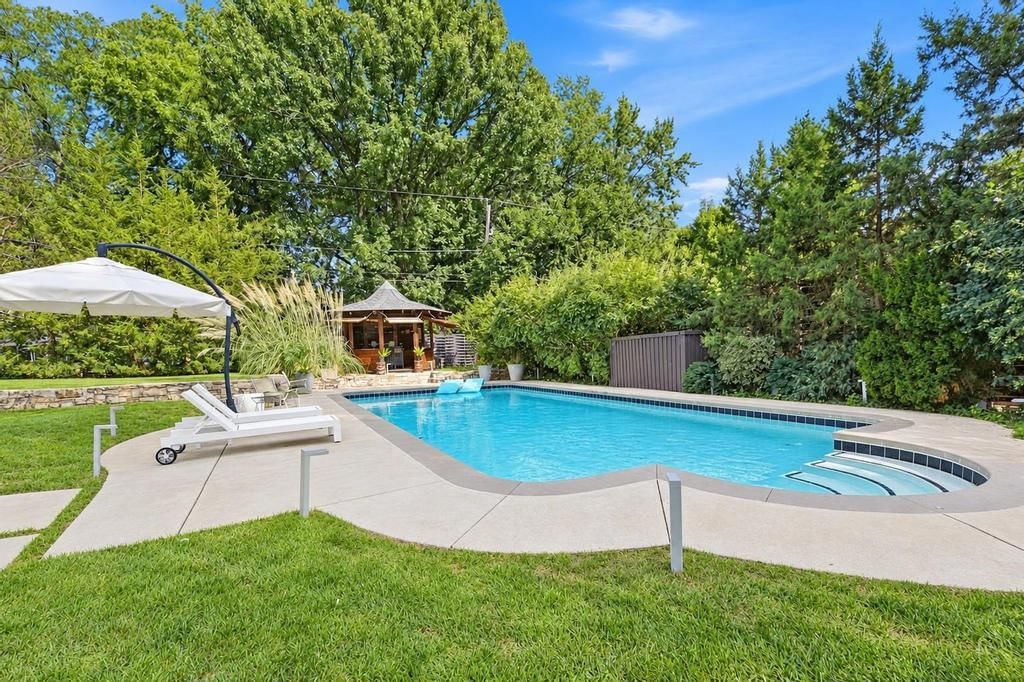 In-ground pool at 5811 Cherokee Drive, Fairway, KS 66205