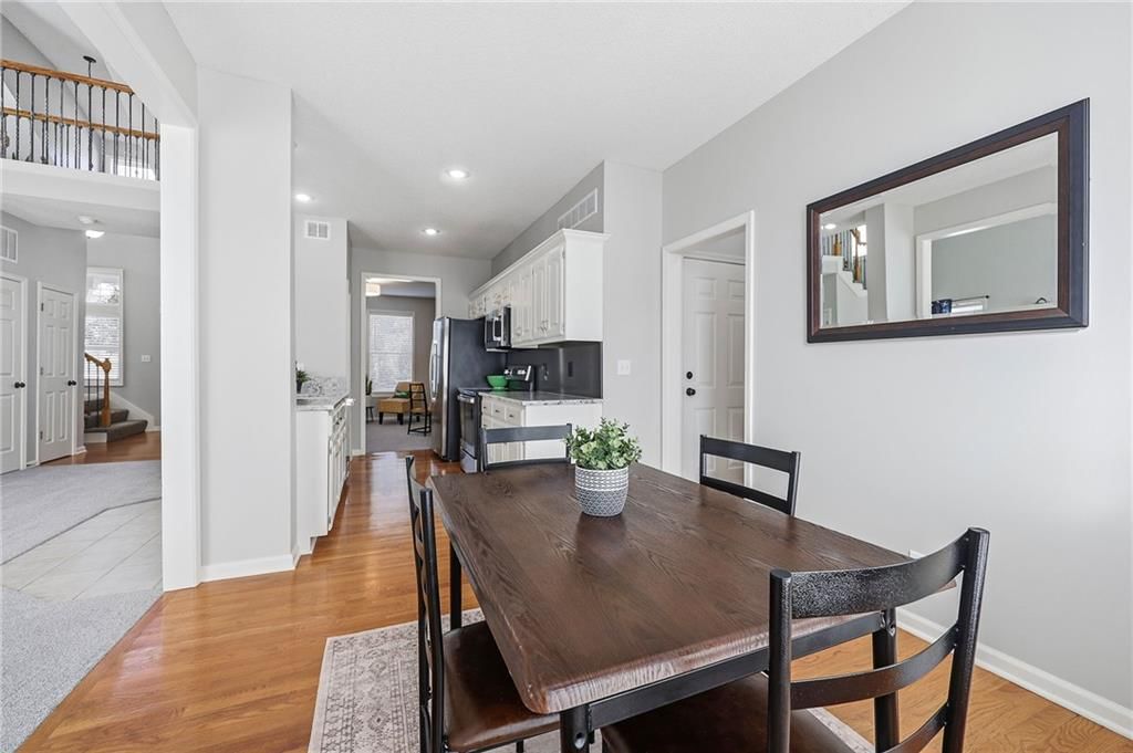 Statement lighting and walk-in pantry at 2325 W Piatt Lane, Olathe, KS 66061