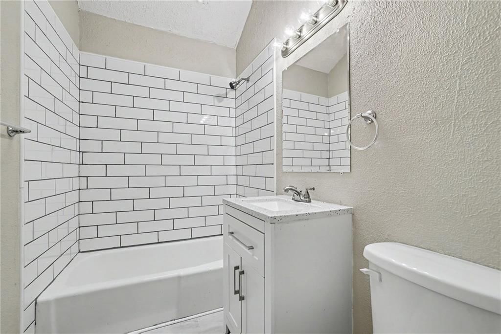 Tiled shower at 8605 Spring Valley Road, Raytown, MO 64138