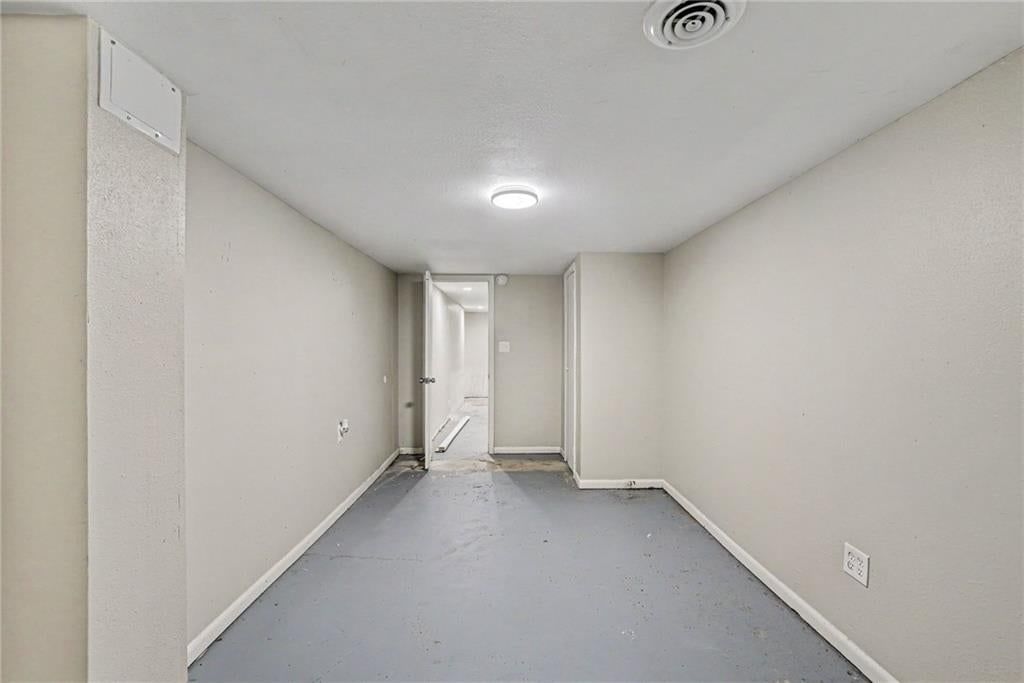 Recessed lighting and staircase at 8605 Spring Valley Road, Raytown, MO 64138