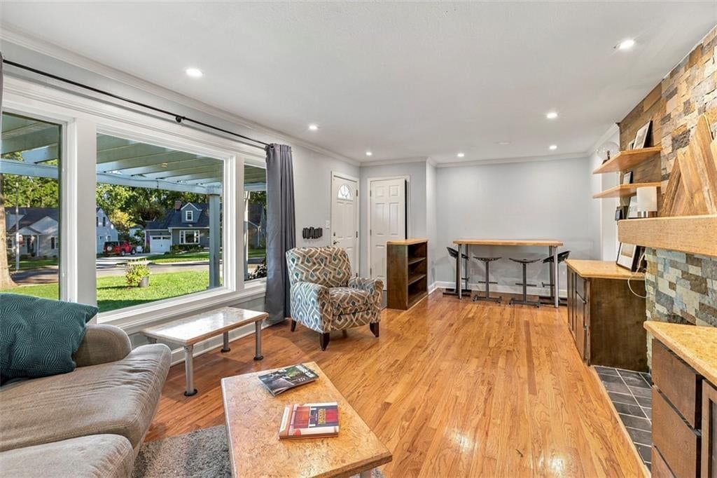 Hardwood floors, recessed lighting and white trim at 3007 W 73rd Terrace, Prairie Village, KS 66208